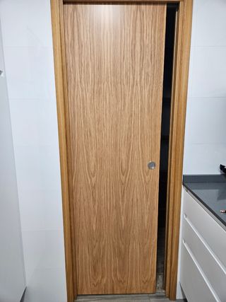 Puerta corredera de madera