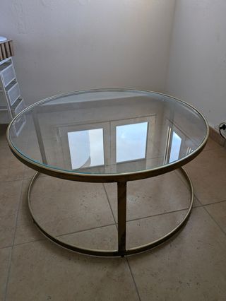 Mesa eclipse baja redonda cristal y metal dorado.