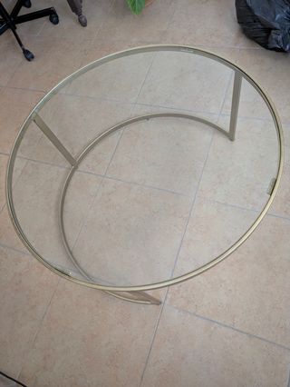 Mesa eclipse baja redonda cristal y metal dorado.