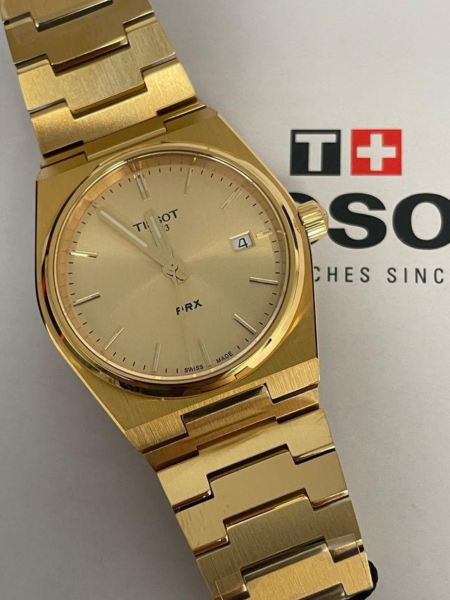Reloj Tissot PRX Dorado 35mm T137.210.33.021.00