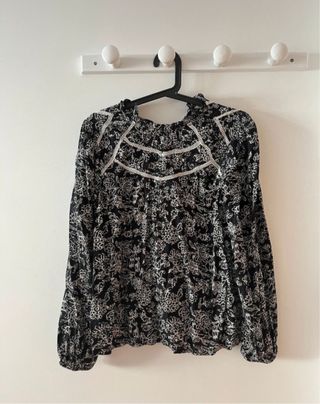 Blusa estampada manga larga