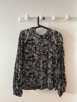 Blusa estampada manga larga
