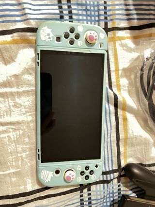 Nintendo Switch OLED nera e bianca