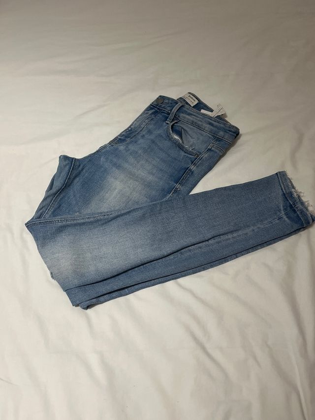 Vaqueros pitillo desgastados