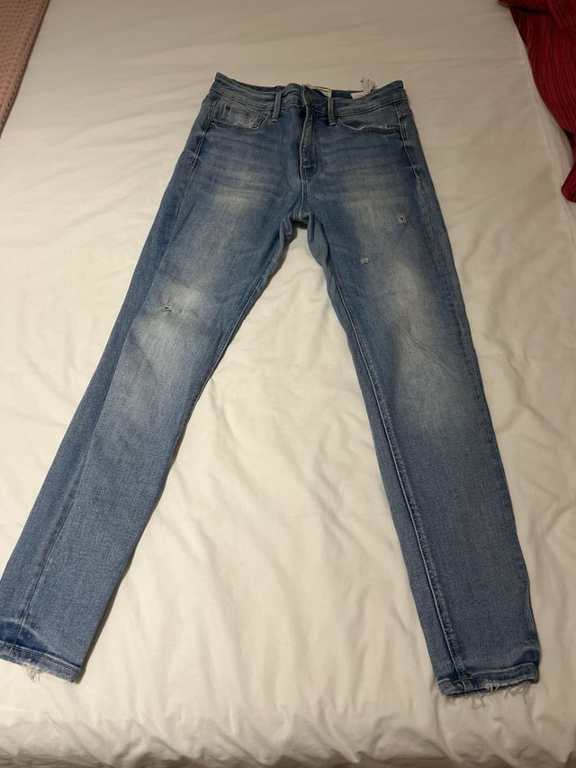 Vaqueros pitillo desgastados
