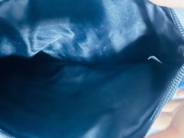 Neceser estampado geométrico con borlas