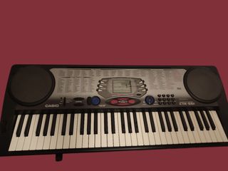 TecladoElectrónico Casio CTK-551 , soporte y pedal
