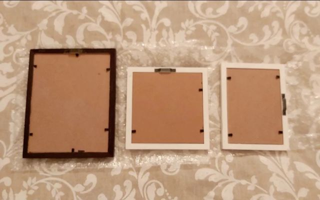 Set di 5 cornici decorative in bianco e nero