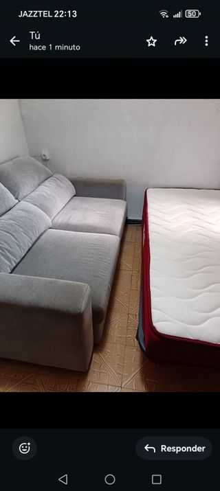 Sofá cama gris de tela