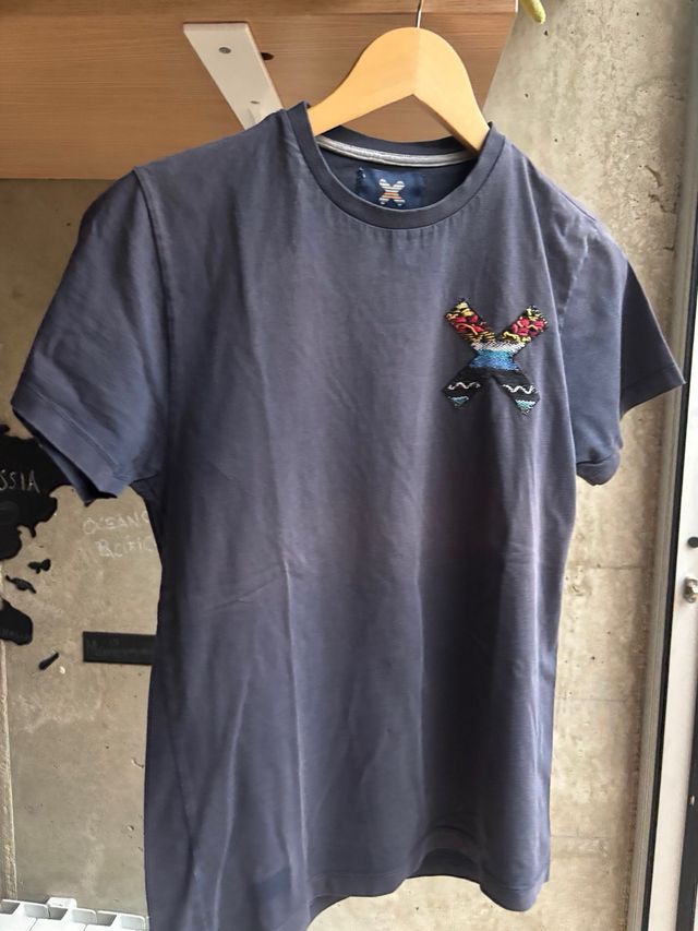 Camiseta Blue Banana T XS azul marino con parche.
