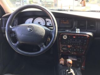 VOLANTE OPEL VECTRA B,MUY NUEVO.MUY POCO USO..