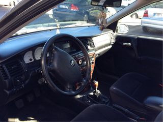 VOLANTE OPEL VECTRA B,MUY NUEVO.MUY POCO USO..