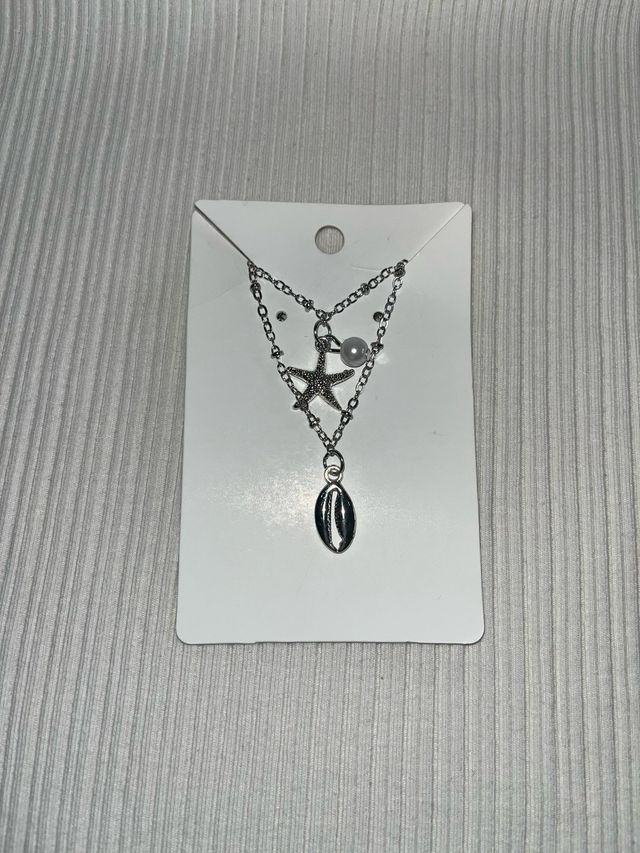 Par de collares con accesorio de concha a elegir