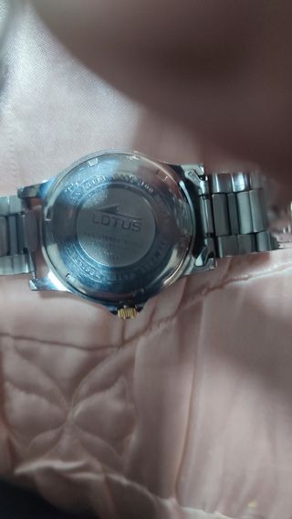 Reloj Lotus Oro y Plata