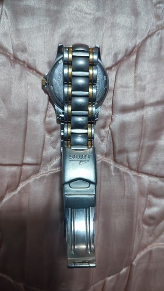 Reloj Lotus Oro y Plata