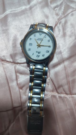 Reloj Lotus Oro y Plata