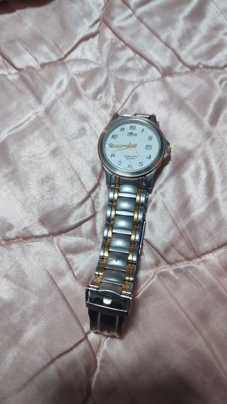 Reloj Lotus Oro y Plata