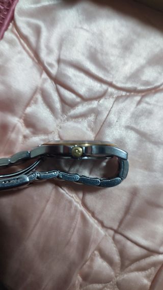 Reloj Lotus Oro y Plata