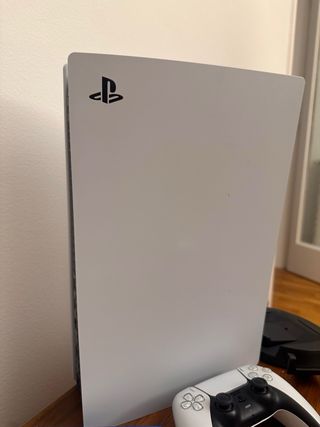 Consola PS5 con lector + 2 juegos