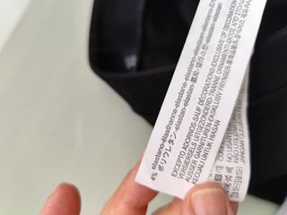 Pantalón pitillo negro con botones