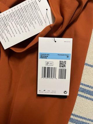 Mallas Nike naranjas largas