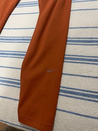 Mallas Nike naranjas largas