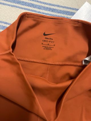 Mallas Nike naranjas largas