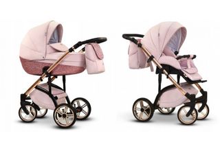 Carrito de bebé rosa con detalles brillantes