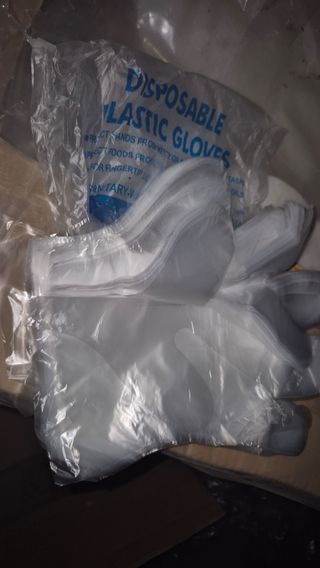 Guantes desechables de plástico caja de 100u