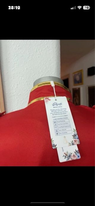 Chaqueta de fiesta dorada y roja
