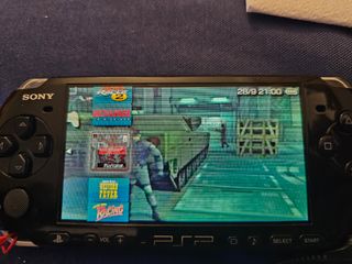 Sony PSP 3003 Negra + 4 UMDs