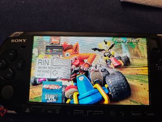 Sony PSP 3003 Negra + 4 UMDs