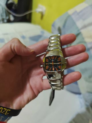 Reloj Lotus Plata y Naranja