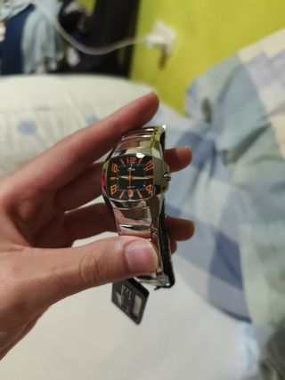 Reloj Lotus Plata y Naranja