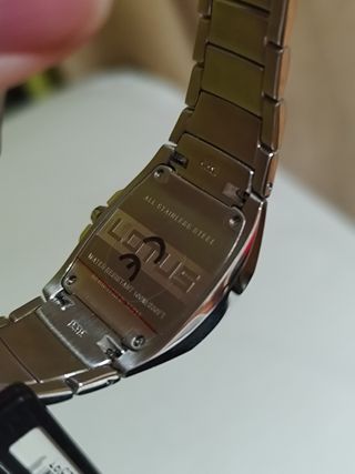 Reloj Lotus Plata y Naranja