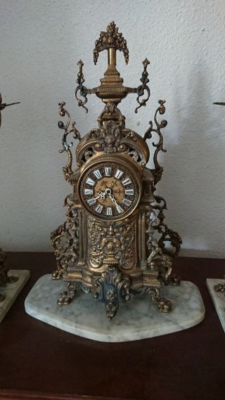 Reloj y Candelabros