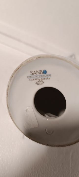 Figura de porcelana con baño de oro