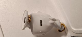 Figura de porcelana con baño de oro