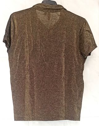 Polo con brillantes dorados 