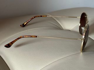 Gafas de sol Hawkers doradas y negras