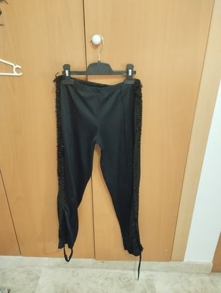 Pantalones de patinaje artístico negros.