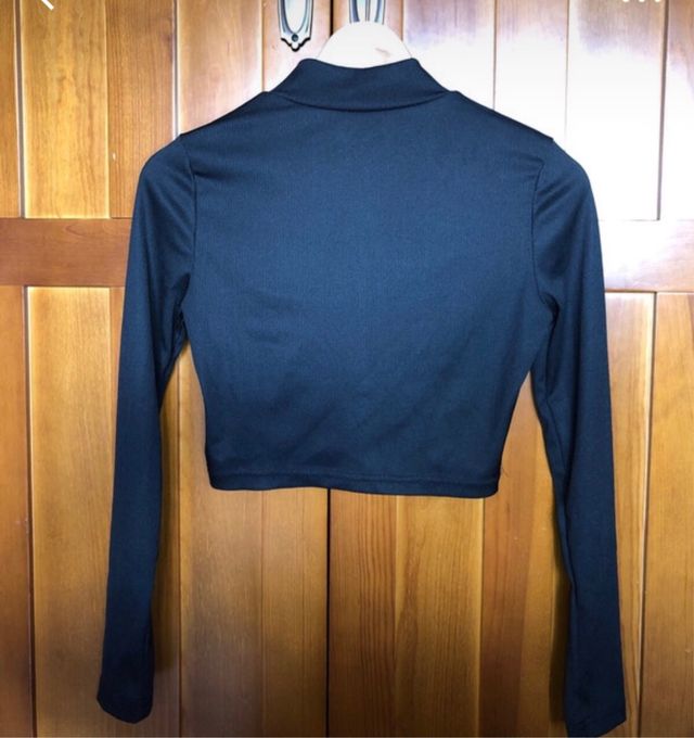 Top deportivo negro manga larga cremallera