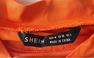 Camiseta Shein naranja cropped manga larga M