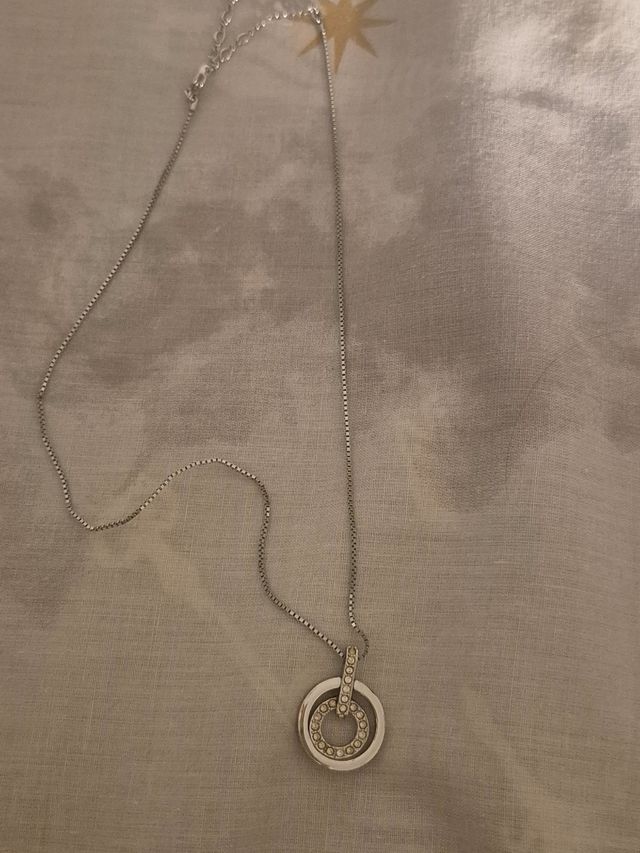 Colgante doble aro con circonitas