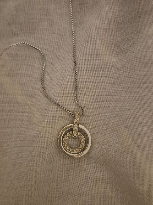 Colgante doble aro con circonitas