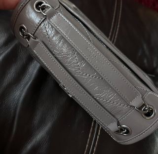 Bolso YSL Niki bandolera gris