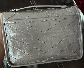 Bolso YSL Niki bandolera gris