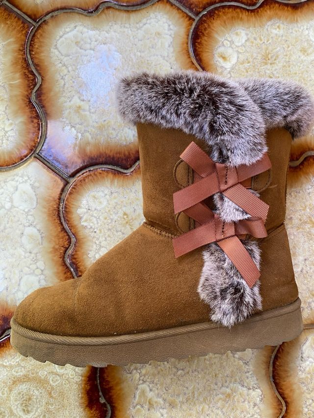Botas de mujer con lazo y pelo