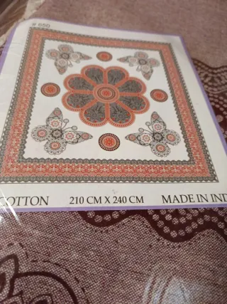 COLCHA COLOR BERENJENA CON MARIPOSA 2 STOCK