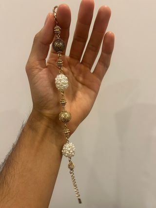 Bracciale donna perle e dettagli dorati